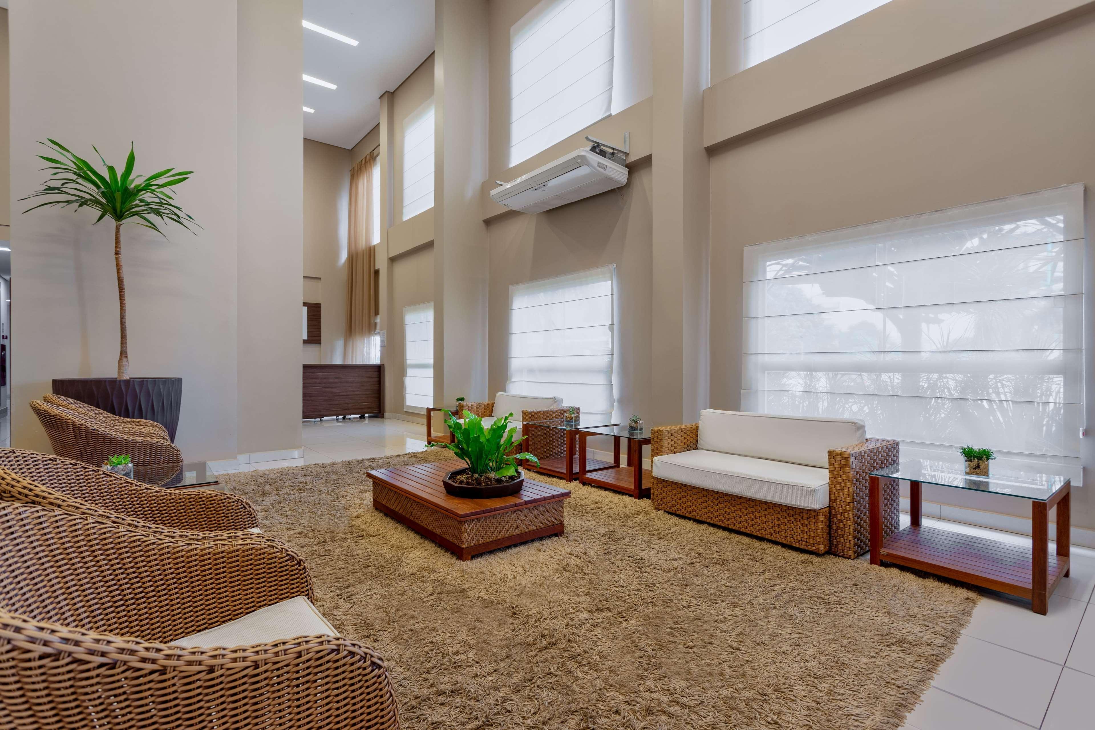 Wyndham Olimpia Royal Hotels Exteriör bild A living room with a carpet